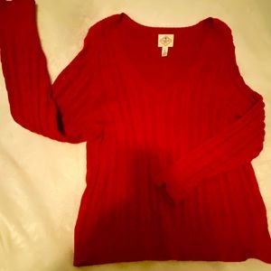 Red v-neck cable sweater by St John’s Bay. Also in cream and heather gray.